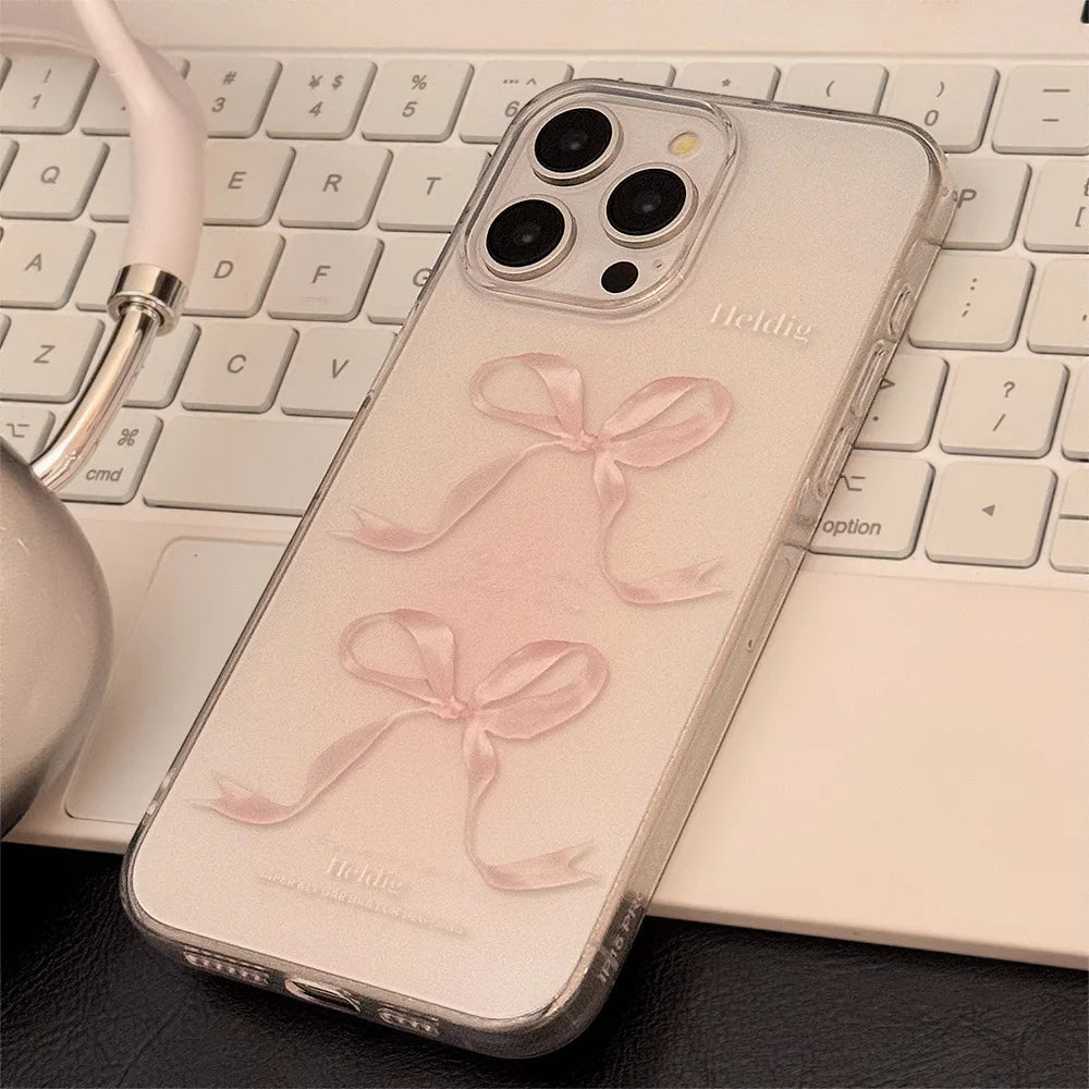 Funda para teléfono con lazos rosas